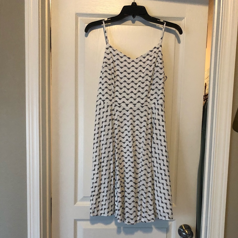 White dress with black triangle pattern